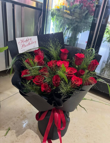 12 Bright red roses